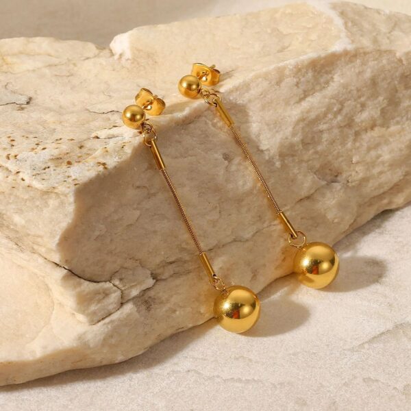 earrings , long earring